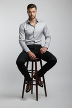 Carlos negro sentado