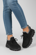 Sneakers negras tres cuartos
